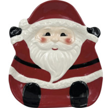 Dekorativ keramiktallrik med jultomte