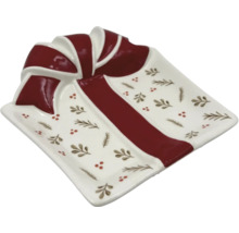 Dekorativ skål i form av en present med rosett och julmönster