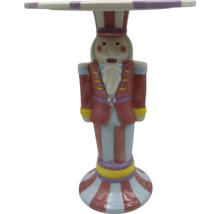 Dekorationsbord i form av en nötknäppare med randig yta