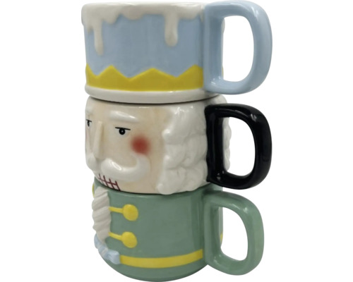 Tre staplade muggar med nötknäppardesign