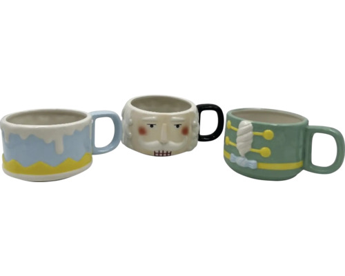 Tre dekorativa kaffemuggar med olika motiv