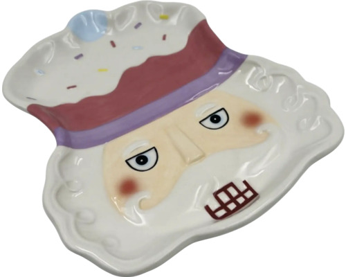 Dekorativ tallrik med nötknäppare ansikte