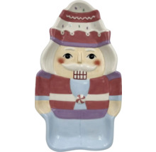 Dekorativ nötknäpparfigur av keramik