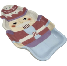 Dekorativ nötknäpparskål av keramik.