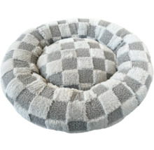 Vadderad djurbädd med rutmönster