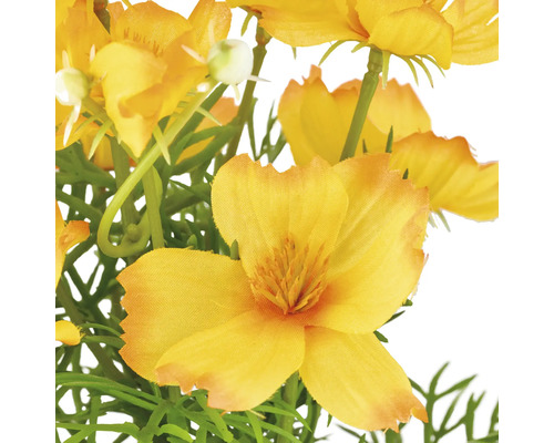 Konstgjorda gula blommor med gröna blad