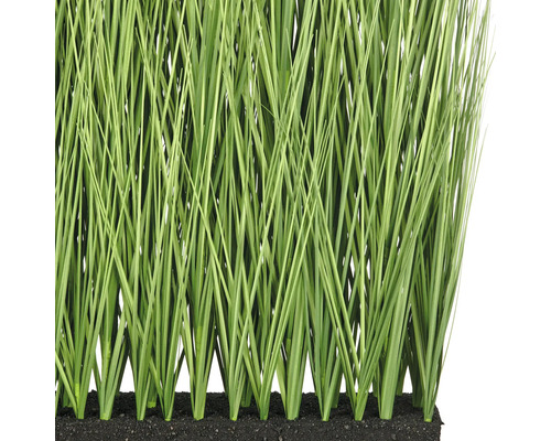 Konstgjort gräs i kruka som dekoration