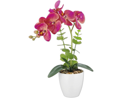 Konstgjord orkidé i vit kruka