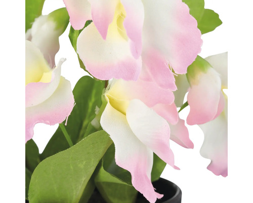 Dekorativ konstgjord orkidé med blommor och blad