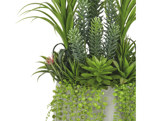 Konstgjorda gröna växter i kruka