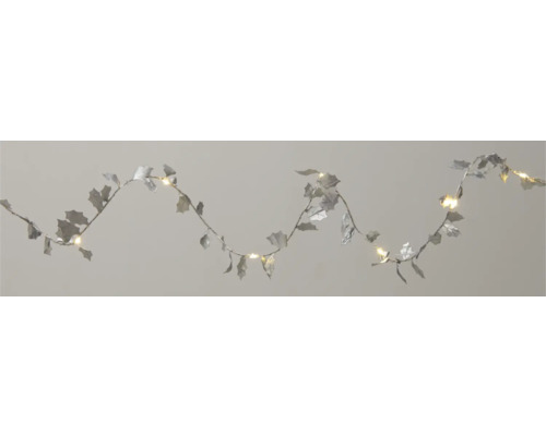 Dekorativ ljusslinga med silverfärgade blad och varmvitt ljus