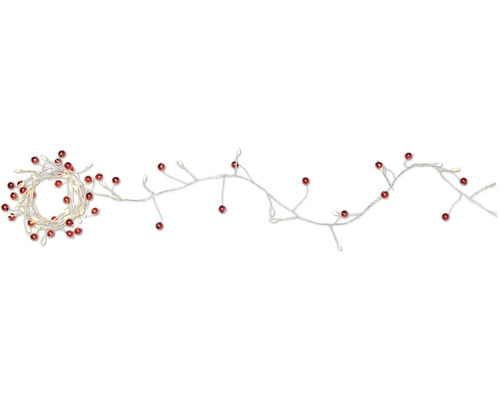 Ljusslinga med röda bär för dekoration