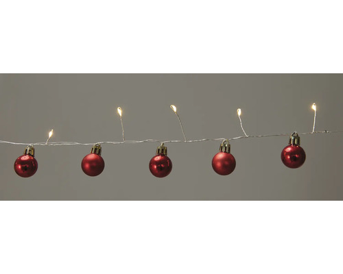 Ljusslinga med röda julgranskulor