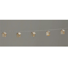 Ljusslinga med trähus som dekoration