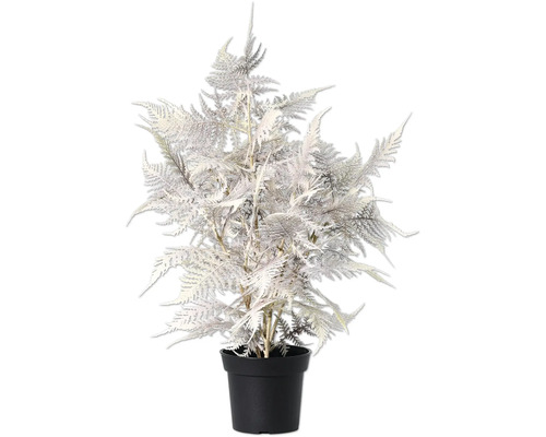 Konstgjord ormbunke i kruka som dekoration