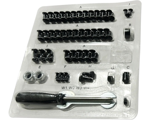 Sortiment med skruvar och verktyg i en transparent plastförpackning