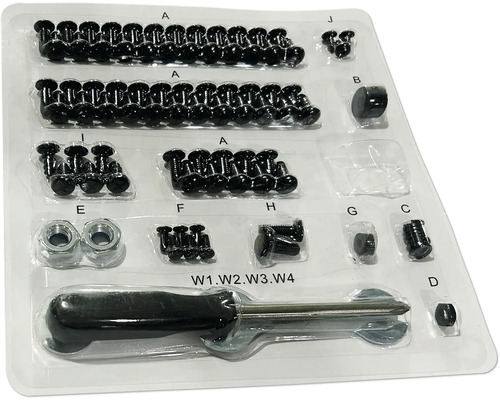 Sortiment med skruvar, muttrar och skruvmejsel i transparent förpackning