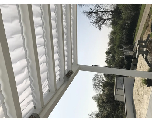 Terrassmarkis med tygtak och värmelampor