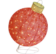 Dekorativ julgranskula med snöflingamönster och belysning på ett stativ