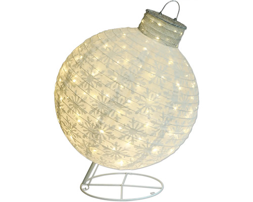 Dekorativ snöflinglampa på ett stativ