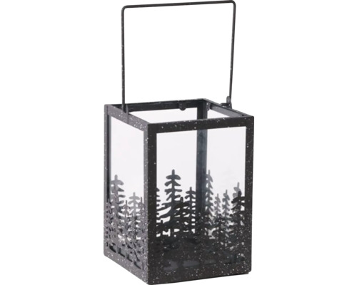 Lyktan av metall och glas med granmotiv