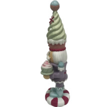 Dekorativ figur av en godisjultomte