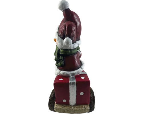 Dekorativ snögubbe figur med present till julperioden