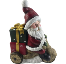 Jultomtefigur på trävagn med presenter