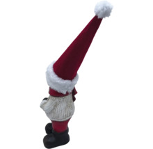 Jultomte med röd mössa som trädgårdsdekoration