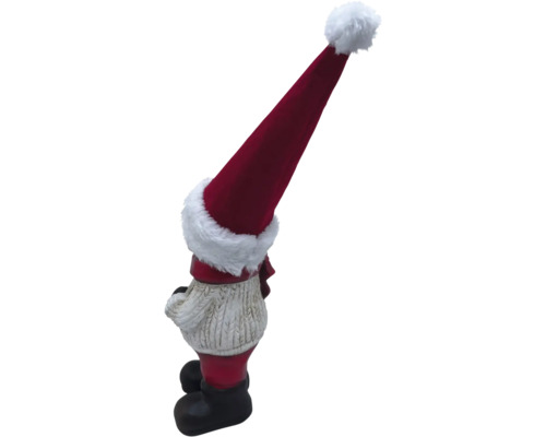 Jultomte med röd mössa som trädgårdsdekoration