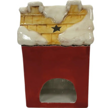 Dekorativ rökugnsminiatyr i form av en skorsten med stjärnmotiv