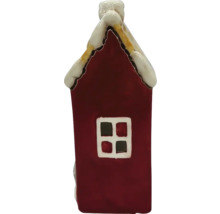 Dekorativ husfigur med fönster och snötäckt tak