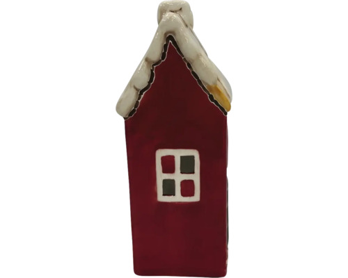 Dekorativ husfigur med snö på taket och fönster