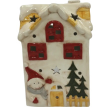 Dekorativt ljushus i keramik med julmotiv