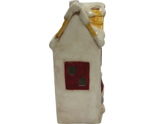 Dekorativt hus i keramik med snö på taket och skorsten.