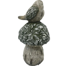 Dekorativ trädgårdsfigur: fågel på svamp