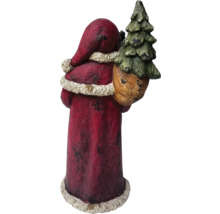 Jultomtefigur med träd i säcken