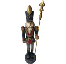 Dekorativ nötknäppare med pinne, en festlig juldekoration