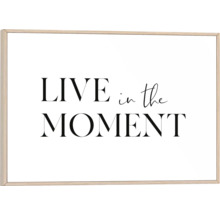 Dekorativ bild med texten ''Lev i nuet'' i en ram