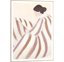 Inramad bild av en kvinna med en randig filt