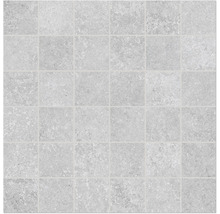 Kakelmönster med fyrkantiga, gra stenplattor