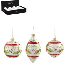 Dekorativa julkulor med mistelmotiv och en ask med julkulor