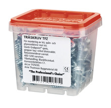 Träskruvar i en transparent plastlåda med rött lock