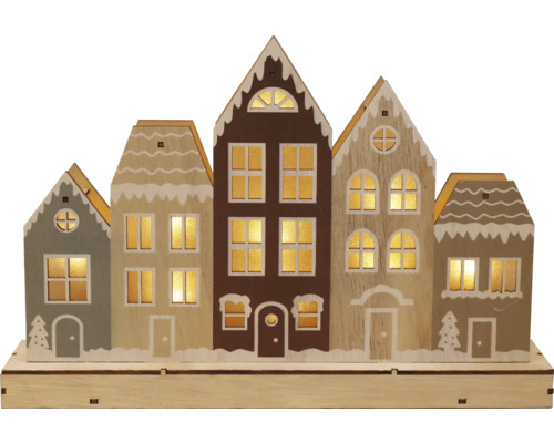 Trädekoration upplysta hus till jul