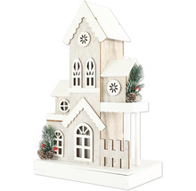 Dekorativt trähus med ornament för jultiden