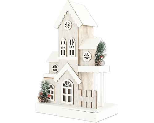 Dekorativt trähus med ornament för jultiden