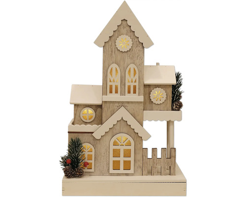 Dekorativt trähus med fönster och staket för julperioden