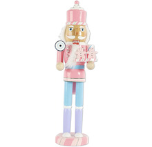 Dekorativ nötknäppare av trä, pastellfärger