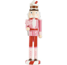 Dekorativ nötknäppare med godismotiv som juldekoration