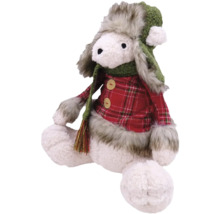 Dekorativ tygdocka med hatt och halsduk